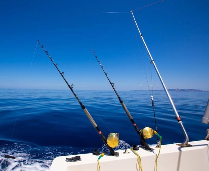 Fishing Boat With Rods — Sunshine Coast Marine Electrical Doctor In Mackay, QLD